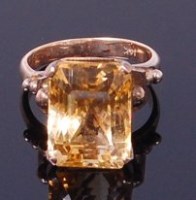Lot 3418 - A modern 14ct gold and citrine set dress ring,...