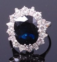 Lot 3422 - An 18ct gold, sapphire and diamond dress ring,...