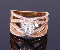 Lot 3423 - A contemporary 14ct gold and diamond ring by...