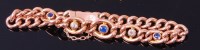 Lot 3300 - A 9ct gold curblink bracelet, set with single...