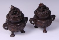 Lot 3485 - A pair of Japanese Meiji period bronze twin...