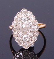 Lot 3303 - An Art Deco 18ct gold and diamond table ring,...