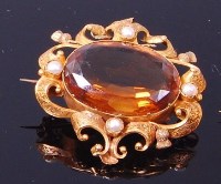 Lot 3316 - A circa 1900 yellow metal, topaz and seed...