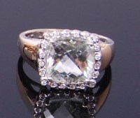 Lot 3402 - An 18ct white gold, aquamarine and diamond set...