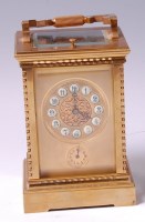 Lot 3592 - A French style lacquered brass carriage clock,...