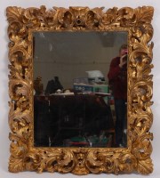Lot 3608 - A Rococo period giltwood and gesso picture...