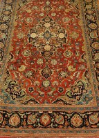 Lot 3610 - A Persian fineweave woollen rug, the red...