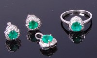 Lot 3414 - A contemporary 14ct and white gold, emerald...