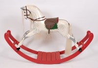 Lot 3645 - A Lines extra carved dapple-grey rocking horse,...