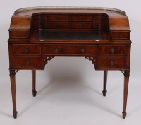 Lot 3659 - A walnut Carlton House type desk, having...