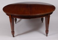 Lot 3664 - A C19th mahogany extending dining table, the...