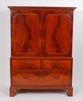 Lot 3668 - A George III mahogany linenpress, having...