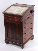 Lot 3675 - A George IV rosewood slopefront davenport by...