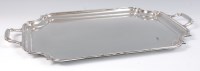 Lot 1122 - A silver twin handled drinks tray, having...
