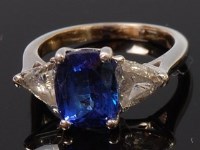 Lot 1317 - An 18ct white gold, tanzanite and diamond ring,...