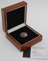 Lot 184 - Great Britain, cased 1989 gold half sovereign,...