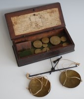 Lot 203 - An 18th century mahogany cased set of coins...