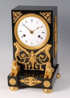 Lot 1551 - A French Empire period bronze and gilt bronze...