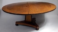 Lot 1587 - A Regency oak pedestal breakfast table, the...