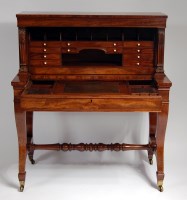 Lot 1645 - *A late Regency mahogany secrétaire cabinet,...