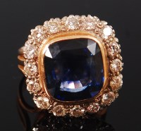 Lot 1158 - An 18ct gold, sapphire and diamond set ring,...