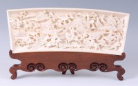 Lot 1397 - A Chinese Qing Dynasty carved ivory panel, of...