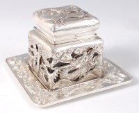 Lot 1400 - A Japanese Meiji period silver inkwell on...