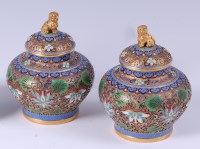 Lot 1406 - A pair of small Chinese gilt bronze and...