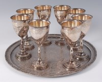 Lot 1427 - An Iranian white metal serving tray, of...