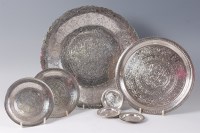 Lot 1431 - A matched suite of Persian silver tablewares,...