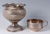 Lot 1432 - A Middle Eastern silver pedestal bowl, having...