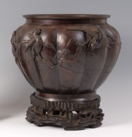 Lot 1443 - A Japanese Meiji period bronze jardiniere, of...
