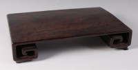 Lot 1437 - A 19th century Chinese hardwood 'kang' vase...