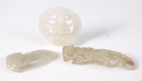 Lot 1440 - A Chinese carved celadon jade belt hook, as a...