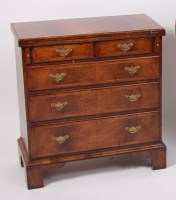 Lot 1567 - A walnut bachelors chest, in the early 18th...
