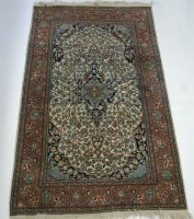 Lot 1570 - A Persian woollen Tabriz rug, having a centre...