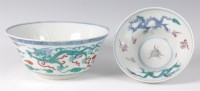 Lot 1441 - A Chinese porcelain dragon bowl, the exterior...