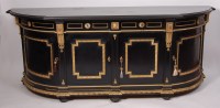 Lot 1576 - A pair of ebonised and ormolu mounted polished...