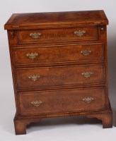 Lot 1579 - A walnut and figured walnut bachelors chest,...