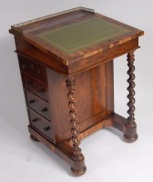 Lot 1585 - A Regency rosewood writing Davenport, having a...