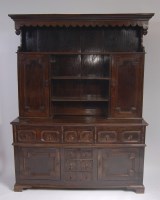 Lot 1589 - An 18th century oak dresser, the upper section...