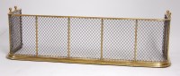 Lot 1594 - A Regency brass and wirework sparkguard, the...