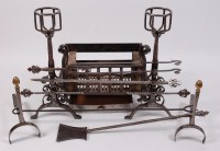 Lot 1595 - *A Victorian Gothic Revival steel and wrought...