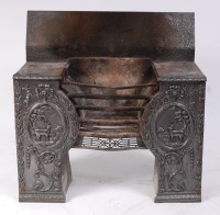 Lot 1596 - A Victorian cast iron fireplace, in the manner...