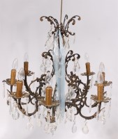 Lot 1597 - A pair of gilt metal eight light electroliers,...