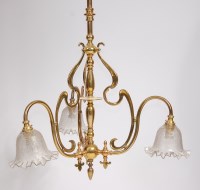 Lot 1598 - An Art Nouveau lacquered brass three light...