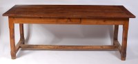 Lot 1649 - A 19th century French fruitwood plank top...