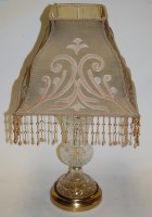 Lot 26 - A pair of modern cut glass table lamps, each...
