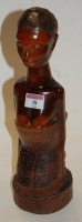 Lot 38 - An African carved hardwood bust of a woman...
