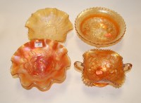 Lot 45 - A Marigold carnival glass bowl, decorated with...